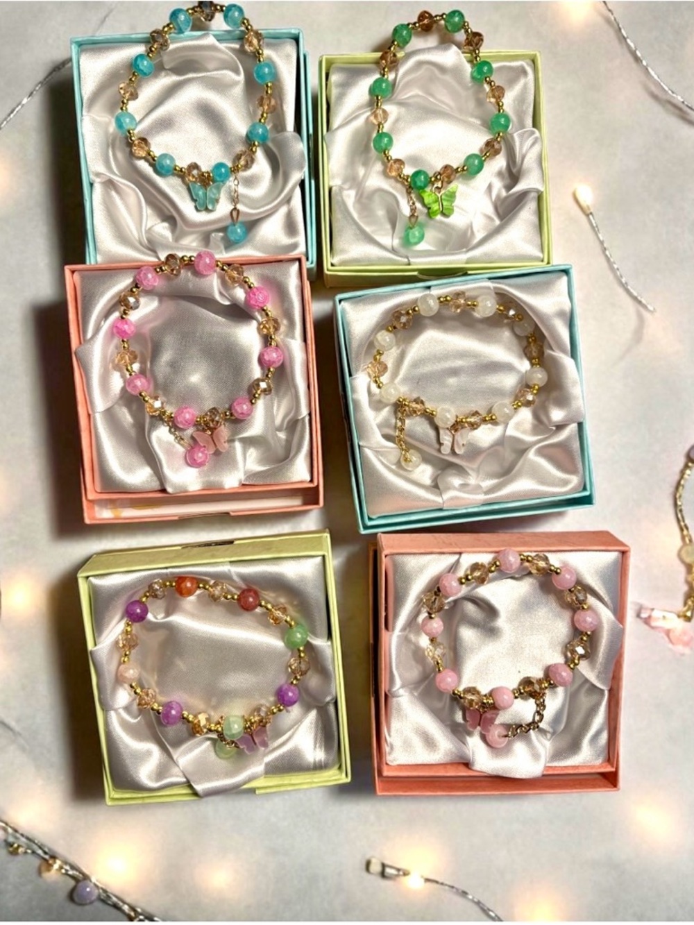 Butterfly color assorted Beaded Bracelet with Gold Accents